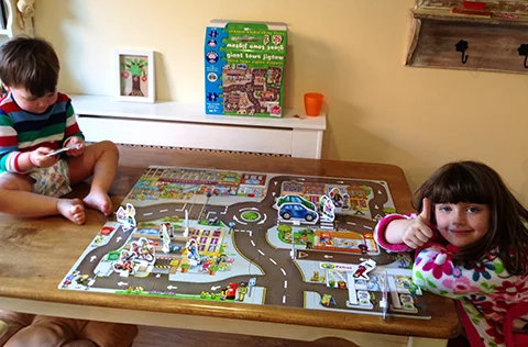 Gabriele And Millisent Learning About Road Safety With Their New Jigsaw 