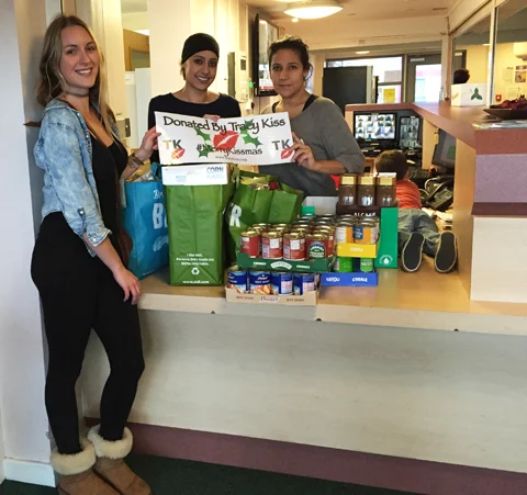 Tracy Kiss Donates Food To Griffin Place Homeless Shelter